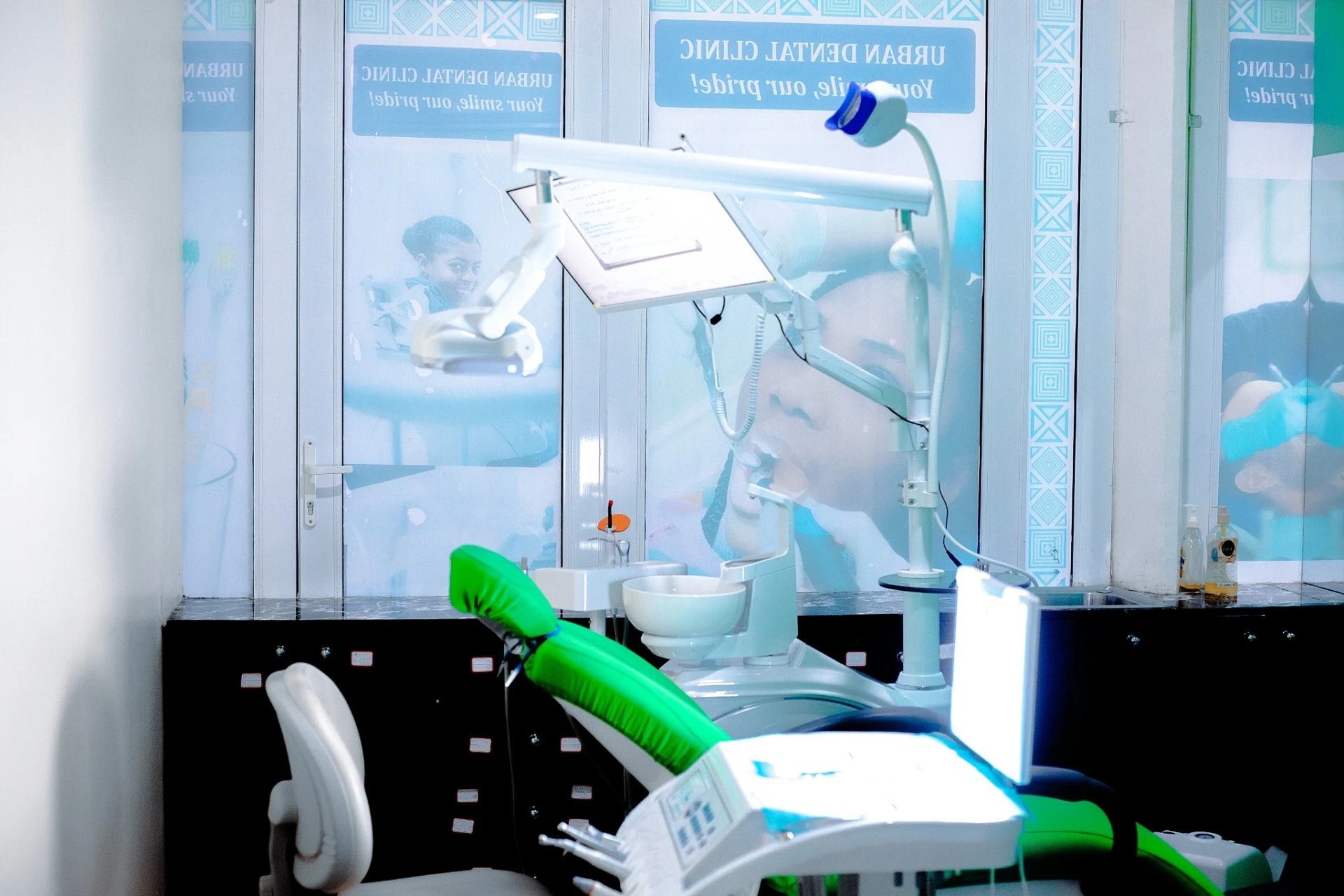 Urban Dental Clinic treatment room with modern dental chair and equipment