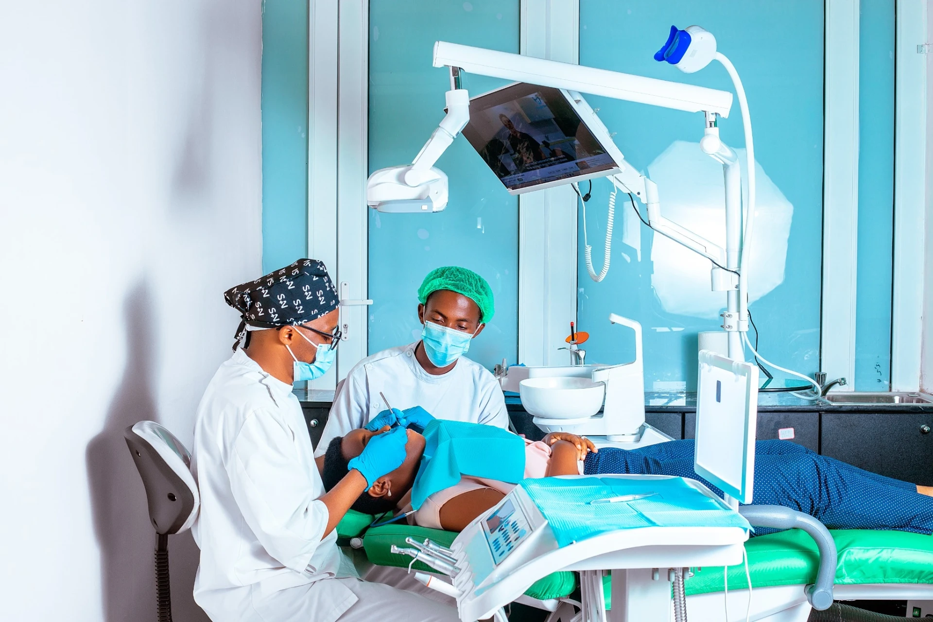 Urban Dental Clinic dentists performing a treatment
